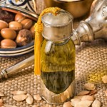 Still life of argan fruit and oil